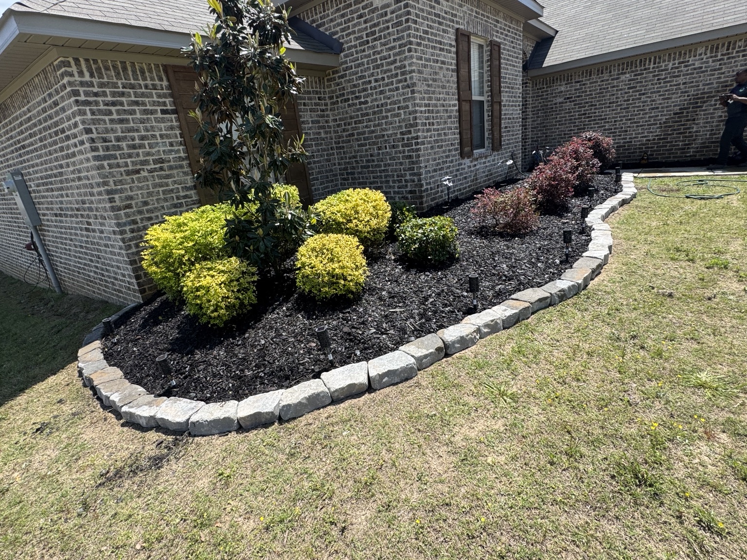 Bush Trimming & Mulch Installation by Advanced Lawn Providers in Central Mississippi