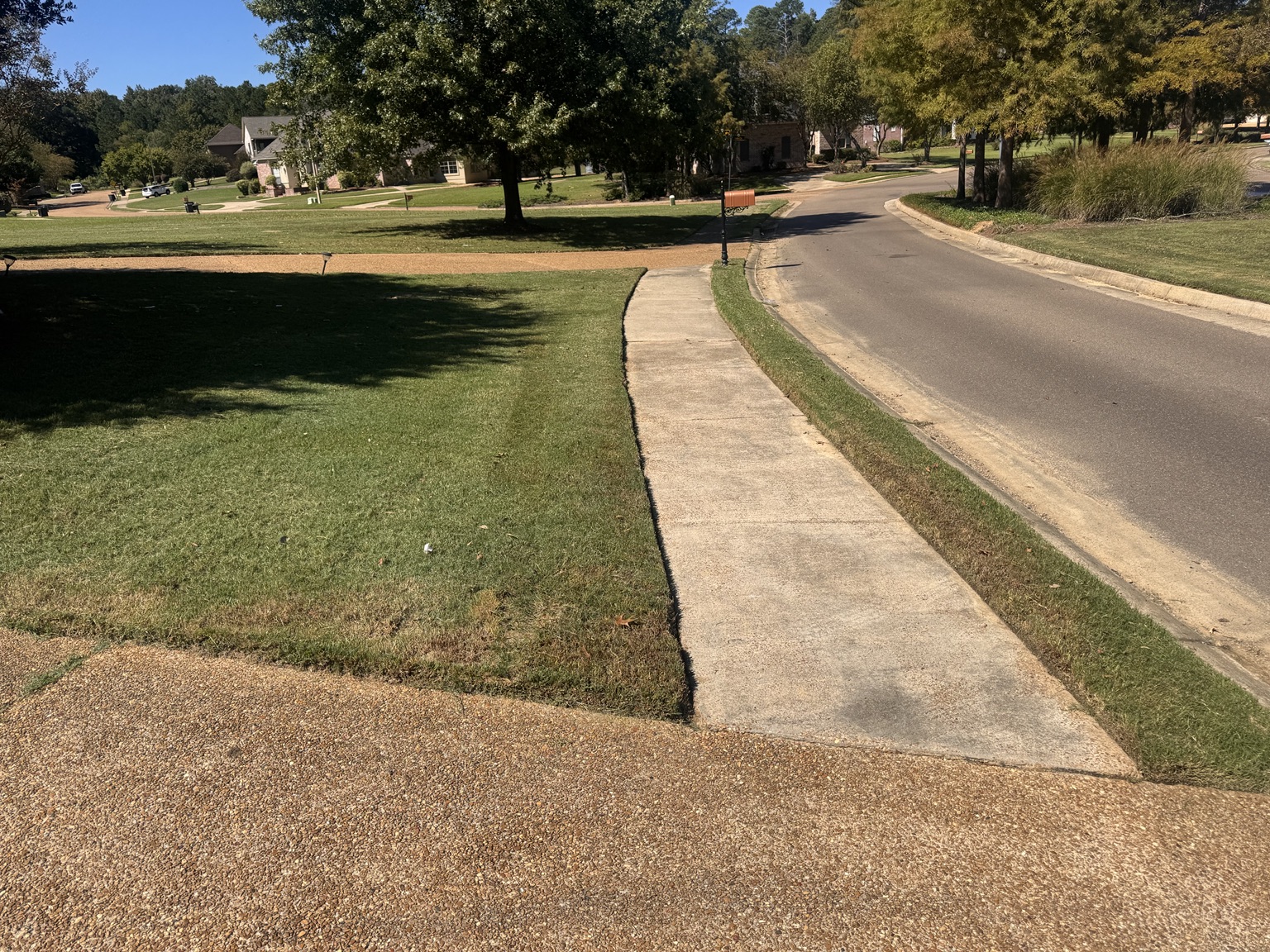Madison Mississippi lawn mowing and edging project view 5